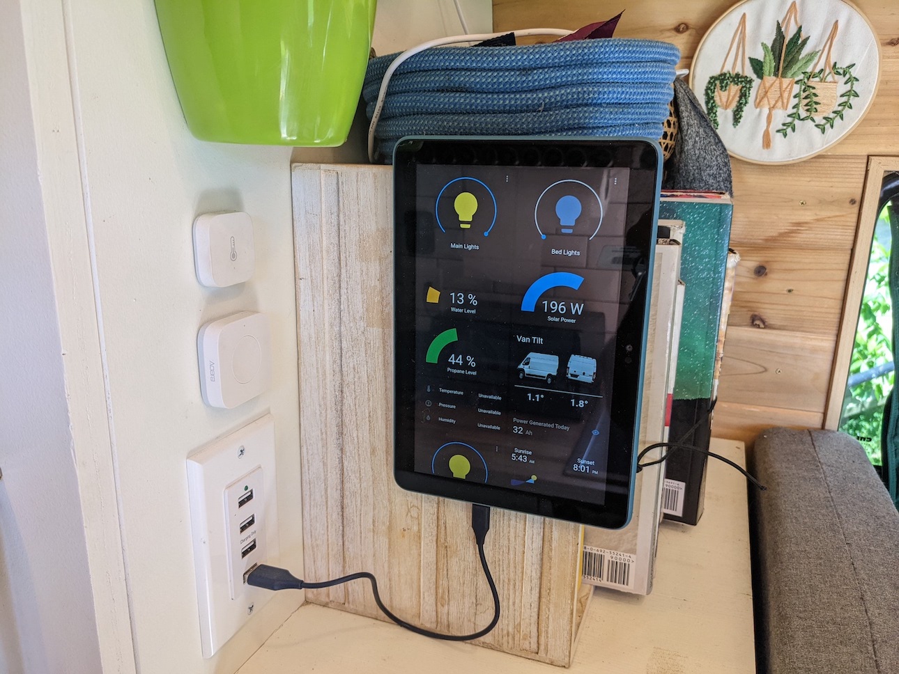 Kindle Fire tablet mounted in the van showing Home Assistant
